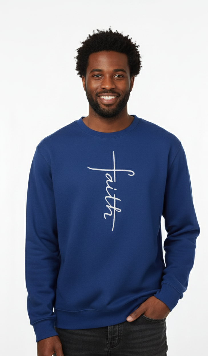 Man wearing a blue sweatshirt with 'faith' embroidered on it in white thread