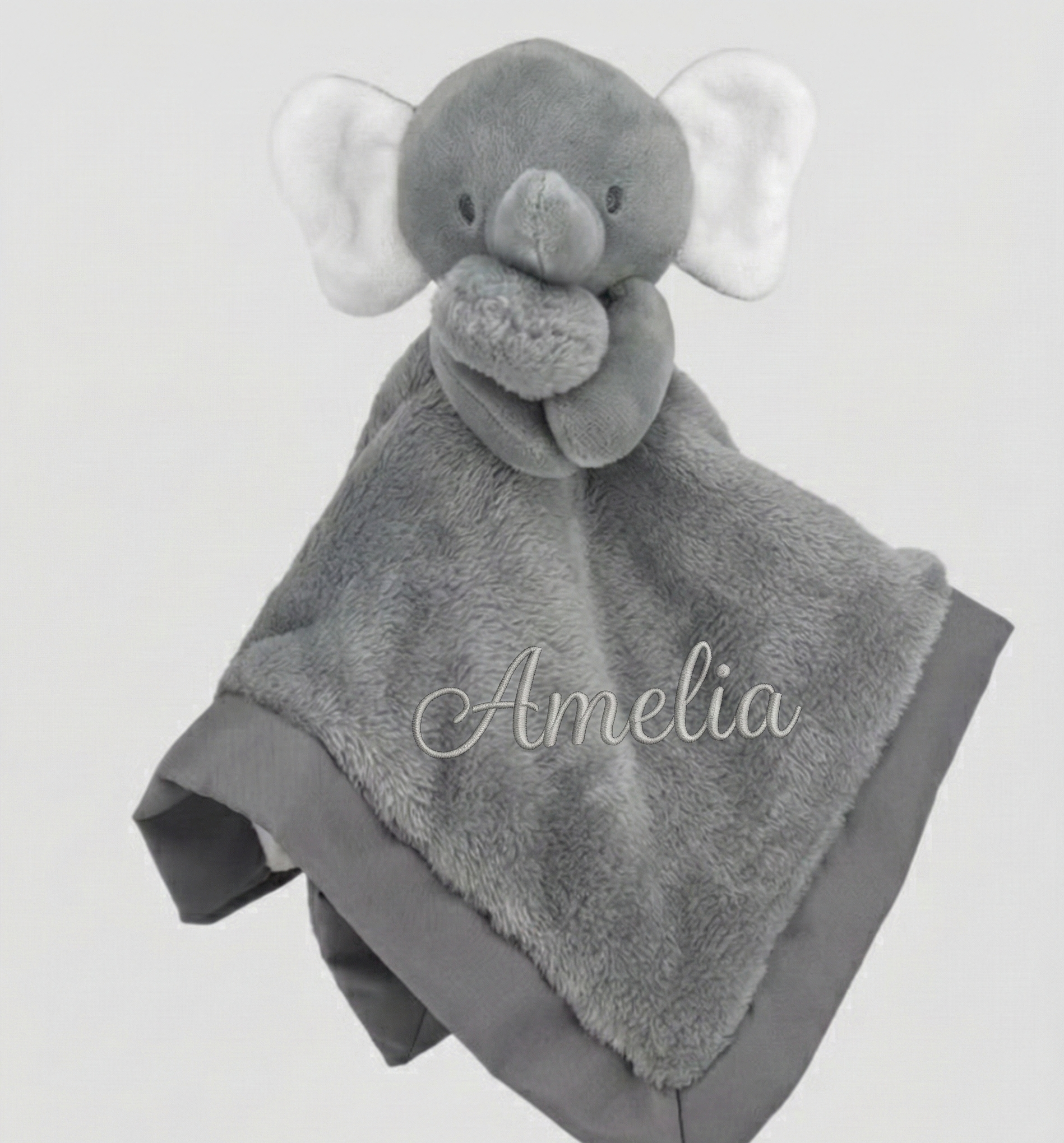 Gray elephant-shaped plush toy with blanket, personalized with 'Amelia', on a light gray background