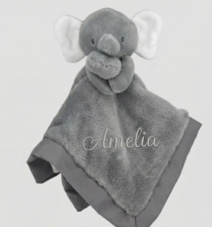 Gray elephant-shaped plush toy with blanket, personalized with 'Amelia', on a light gray background