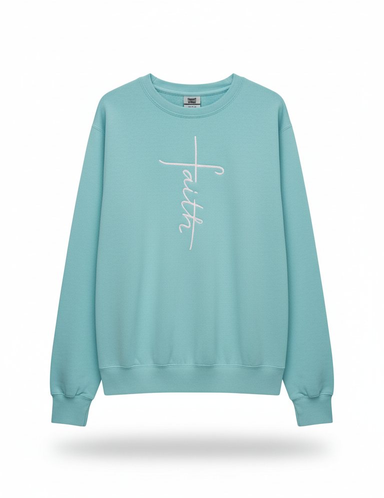 Light blue sweatshirt with a white cross and faith design embroidered In white thread 
