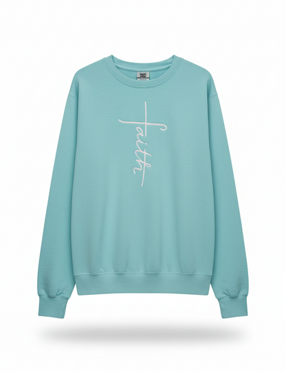 Light blue sweatshirt with a white cross and faith design embroidered In white thread 